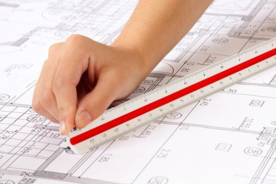 Ruler and hand on acoustic design survey