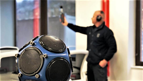 A picture of APT Sound Testing’s acoustic engineer undertaking party floor sound testing in London.